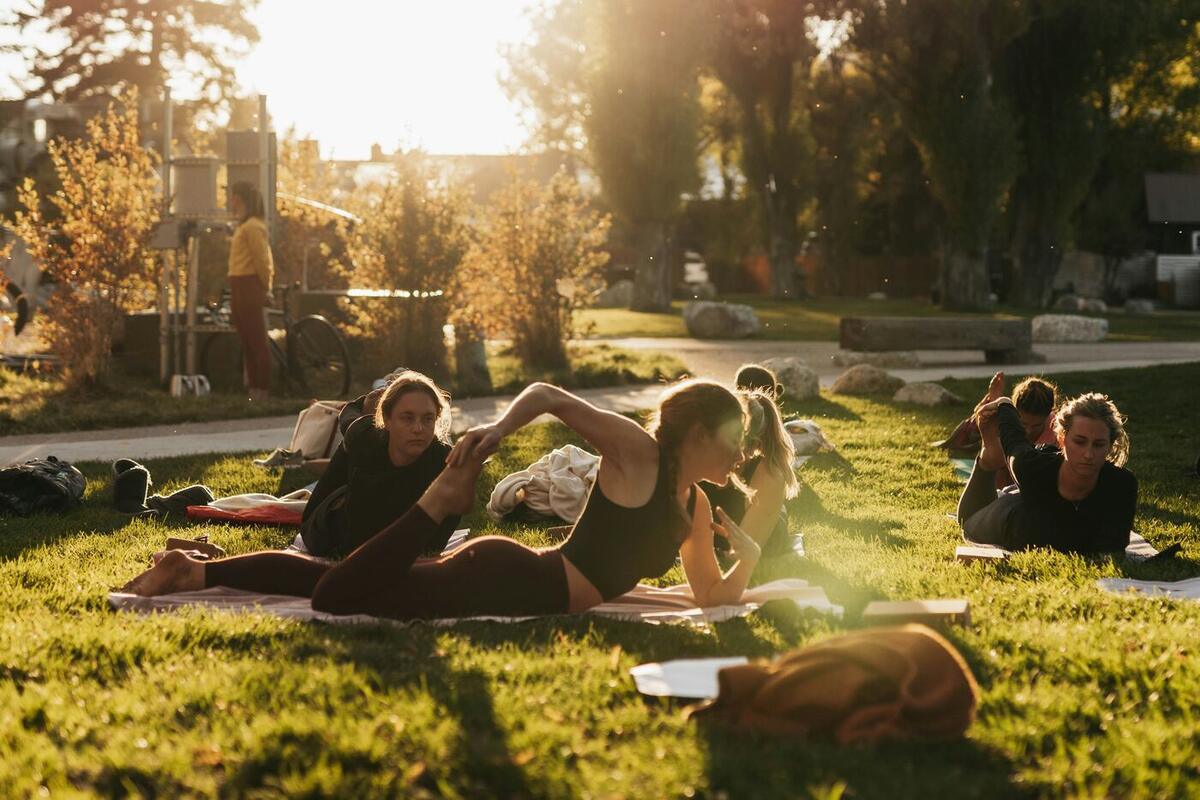 Stretching in a park at golden hour